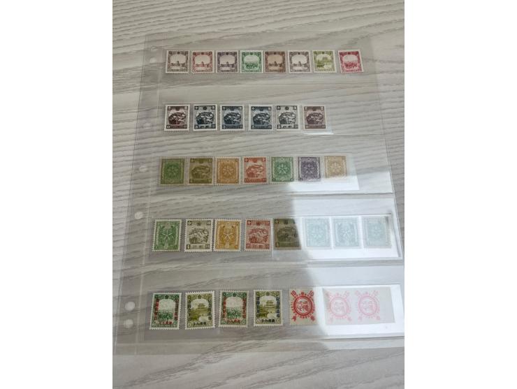 holding in 8 album pages, including the rare 2nd Regular Issue 15c mint. Large quantity. Please view.